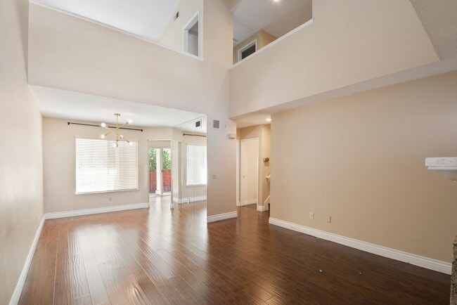 Building Photo - Modern 2BD 2.5BA Townhome with Vaulted Ceilings, Private Pergola Patio, and One-Car attached Garage