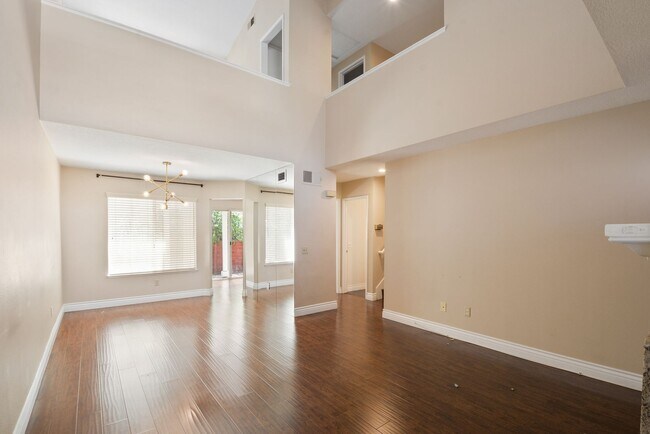 Building Photo - Modern 3BD 2.5BA Townhome with Vaulted Ceilings, Private Pergola Patio, and One-Car attached Garage