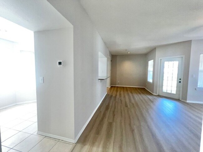 Building Photo - NEW-Remodeled bathroom & kitchen! NEW VINYL PLANK flooring & fresh paint! 2 bedroom 1 bath condo ...
