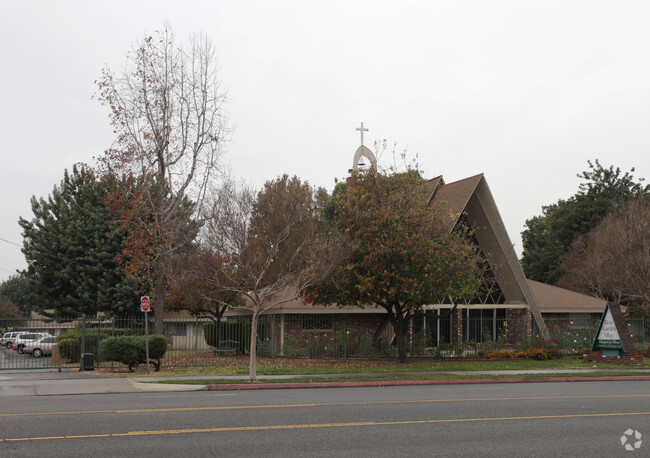 Building Photo - Rose Garden Village