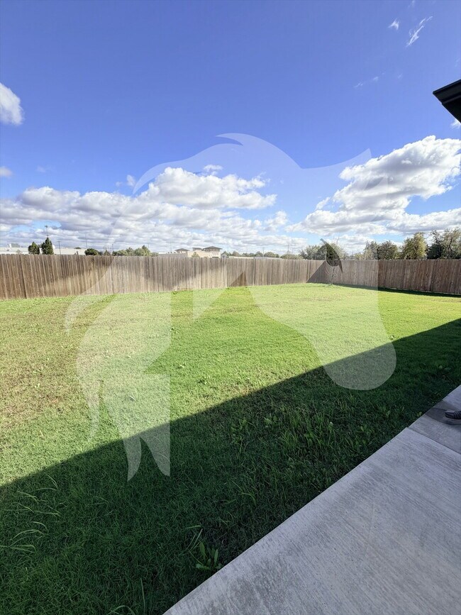 Building Photo - "Stunning 4-Bed Gem with Granite Touch & C...