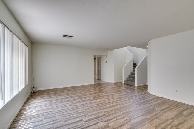 Building Photo - Spacious 4 Bedroom 2.5 Bathroom Home with Covered Patio & Large Backyard