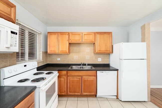 Building Photo - 8989 E 12th Ave