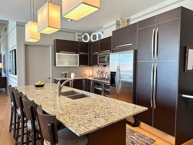 Building Photo - 700 12th Ave S