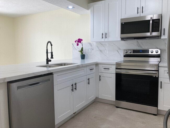 Building Photo - 8069 Boca Rio Dr