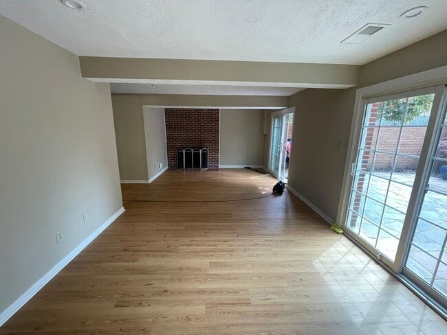 Building Photo - A fully updated Four Bedroom, Three and On...