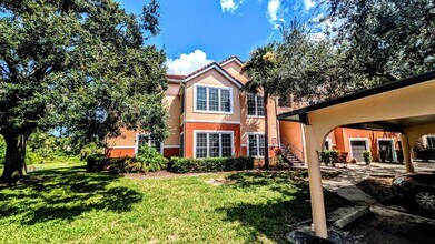 Building Photo - ANNUAL UNFURNISHED GROUND FLOOR CONDO 3 BED 2 BATH