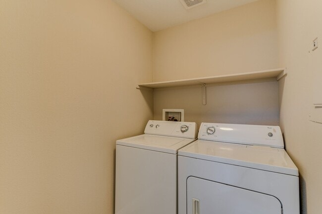 Building Photo - ** COMING SOON!!! ** Charming Henderson Townhome with Double-Sided Fireplace, Stainless Steel Kit...