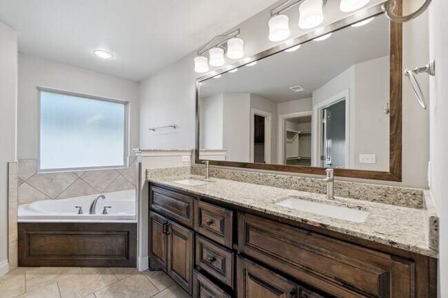 Building Photo - Upscale Comfort Meets Everyday Functionality in This Stunning 3-Car Garage Home!