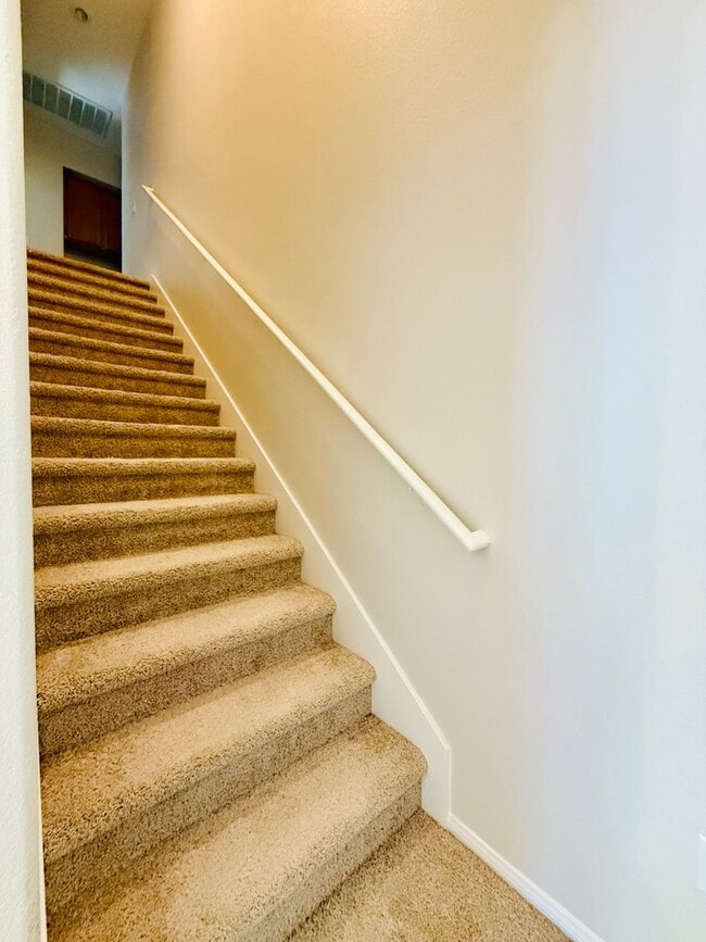 Building Photo - Immaculate and Inviting Two-Story Condo in Lone Mountain Available! 1/2 OFF THE FIRST FULL MONTH'...