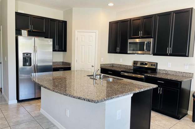 Building Photo - 7049 Summer Holly Pl