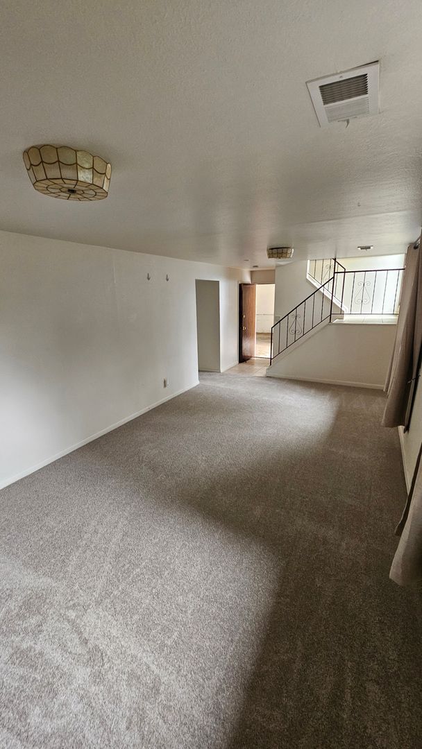 Building Photo - Spacious Bi Level home backing to open spa...