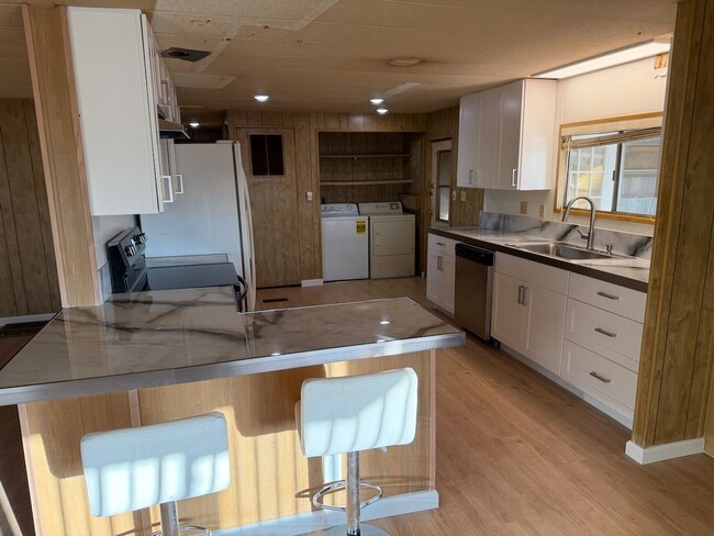 Building Photo - Retire in Style: Your Dream Home in one of...