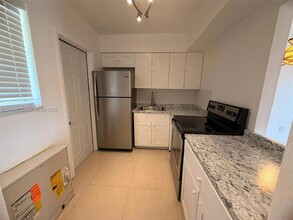 Building Photo - 20200 NE 27th Ct