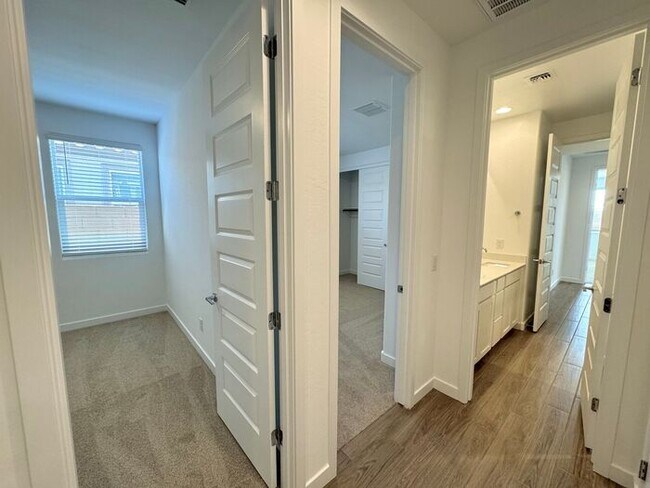 Building Photo - MOVE IN SPECILAS!! New 5-Bedroom Home in Phoenix with Upgrades & Resort-Style Amenities