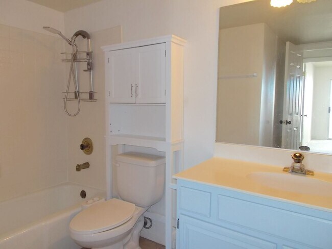 Building Photo - Two-story, 2-bedroom townhome ideally located in the heart of Boulder City