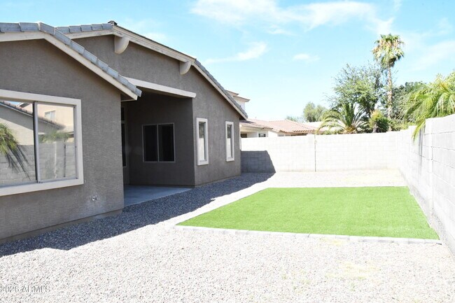 Building Photo - 8787 W Gardenia Ave