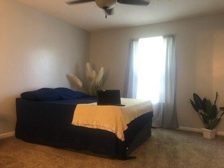 Spacious master bedroom with walk in closet! - 210 Golden Pond Ave
