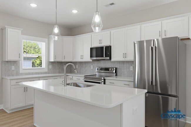 Building Photo - CHIC NEW 2 BEDROOM APARTMENT IN THE CHURCH HILL NORTH NEIGHBORHOOD