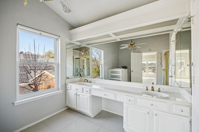 Building Photo - "Spacious 4-Bedroom, 2.5-Bath Living Meets Storybook Backyard Charm!"