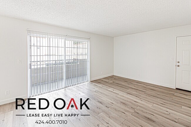 Building Photo - ~1 Month FREE~ Spacious Three Bedroom with...