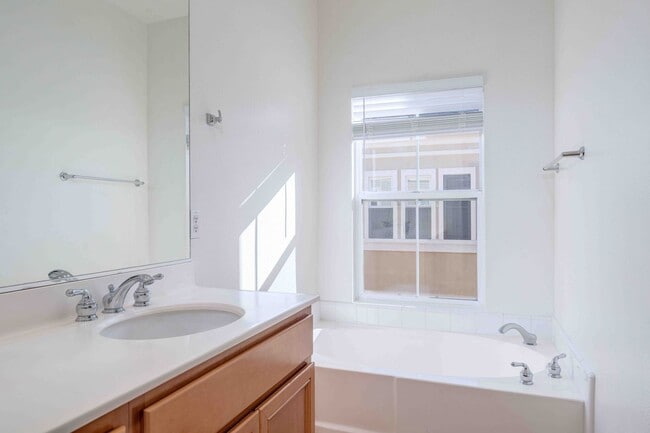 Building Photo - Stunning Upgraded Tri-Level Condo in South Coast Metro’s Exclusive Vantage Community