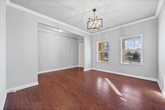 Building Photo - Classic finishes paired with an open, versatile layout!