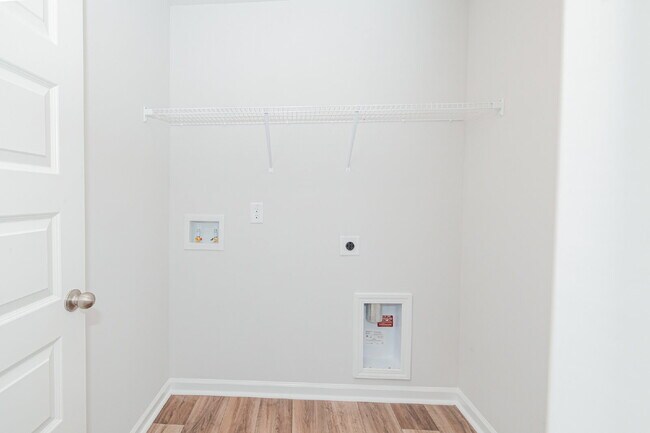 Building Photo - Brand-new 3 bedroom, 2.5 Bath Townhome with pond view