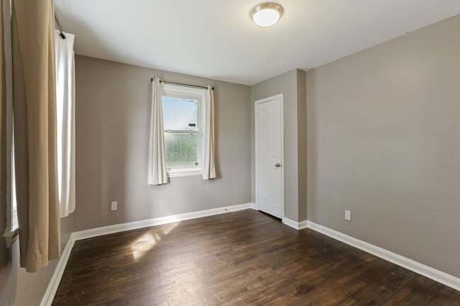 Building Photo - Move-In Ready Cape Cod with 3 Finished Levels & Huge Backyard