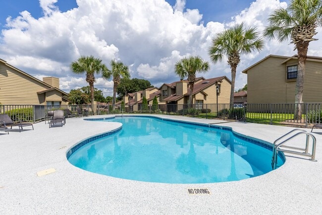 Building Photo - ONE FREE MONTH ON 13 MONTH LEASE! Welcome to this charming 3-bedroom, 2-bath condo located in the...