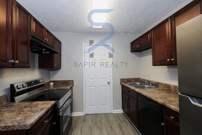 Building Photo - Move in before October 15th and get a $250...