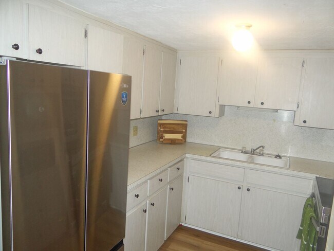 Building Photo - 1/1 condo - 55+ community