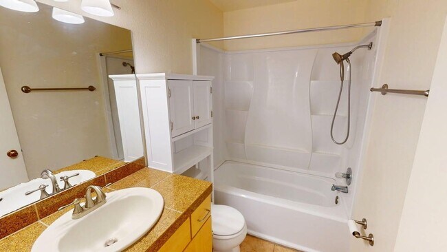 Building Photo - Light-Filled Upstairs Condo in a Prime Location