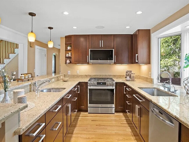Building Photo - Step into this beautifully updated and met...