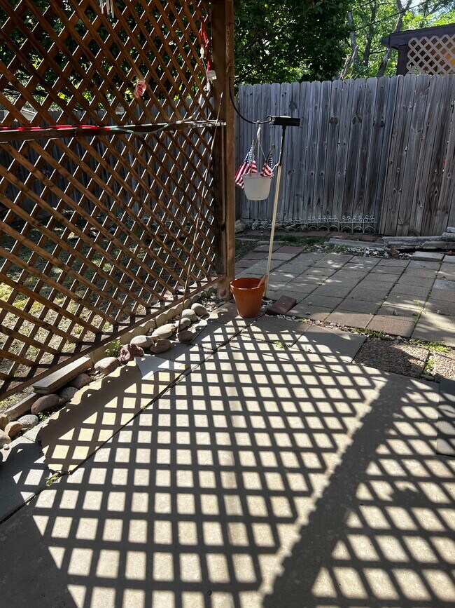 Patio off the kitchen with sliding door. - 5341 SW 15th Ct