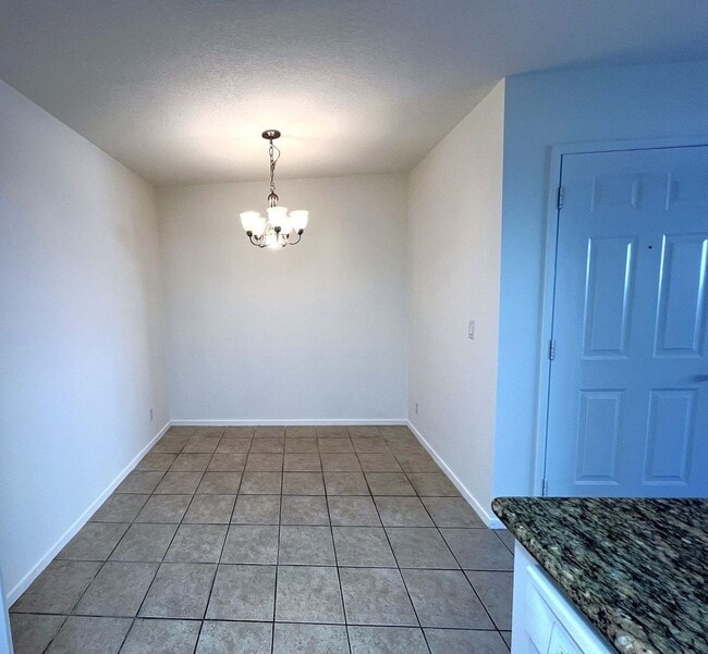 Building Photo - Ground Level 2 Bedroom Condo with Private Patio in Gated Community for Lease