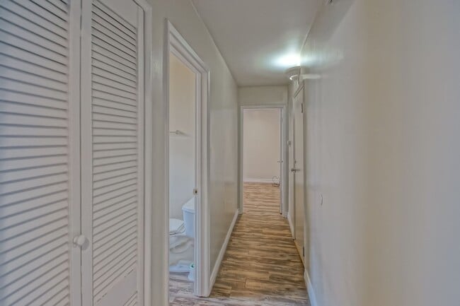Building Photo - CHARMING & AIRY HOME W/ SPACIOUS FENCED YARD & LARGE 2-CAR GARAGE CLOSE TO SCHOOLS, SHOPPING & MI...