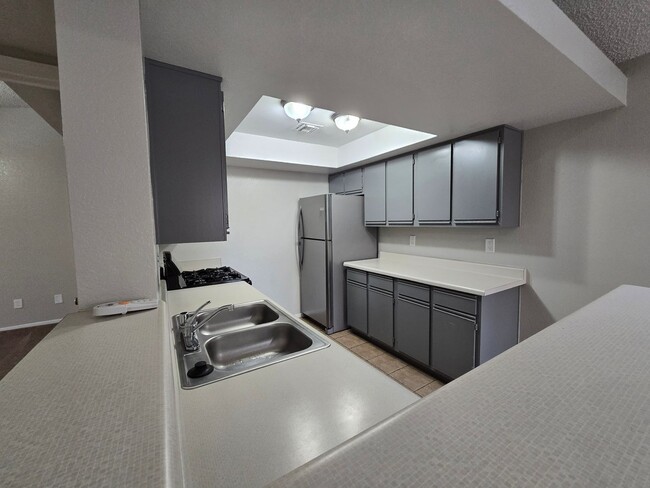 Building Photo - **Spacious 3-Bedroom Condo for Lease – Pri...