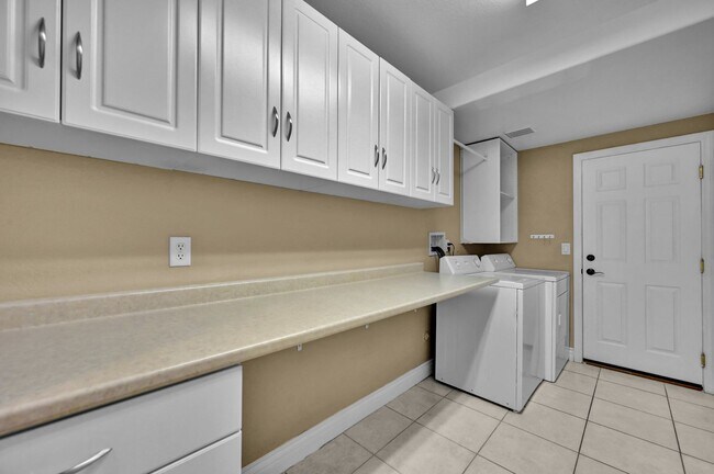 Building Photo - A Fabulous 4 Bedroom Home with a Sparkling Pool!!!