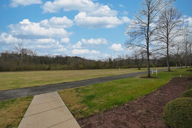 Building Photo - **PRISTINE GARDEN-LEVEL CONDO ON THE FIRST LEVEL NEAR PAVILION AND COMMUNITY GREEN SPACE**