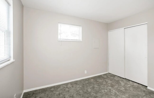 Fresh carpeted bedrooms with closet spaces and beautiful lighting as well. - 1902 E Calvert St