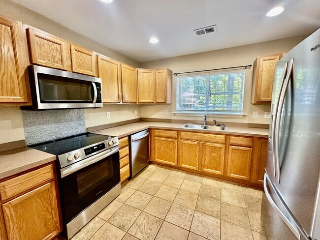 Building Photo - Three Bedroom Home in the Farm with a Lagoon View!