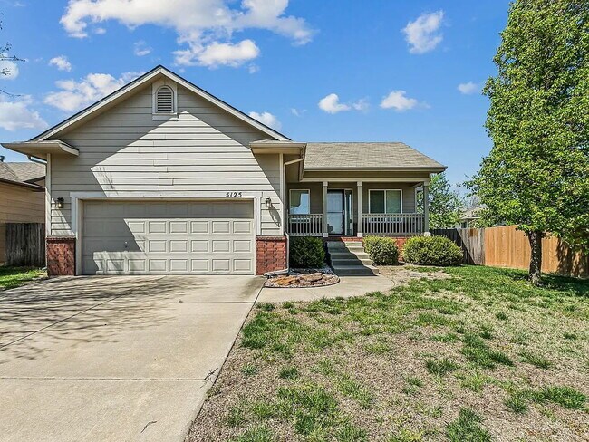 Building Photo - "Spacious 4-Bedroom Family Home with Cozy Fireplace in Wichita - 2261 Sq Ft of Comfort!"