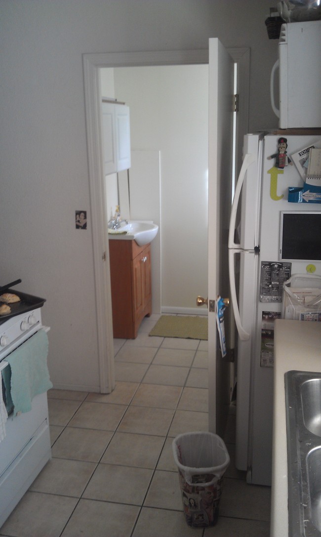 laundry next to kitchen - 1048 E Lester St