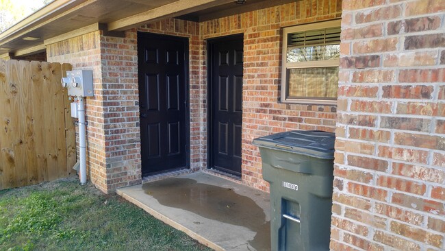 Covered patio / storage closet. - 101 N 1st St