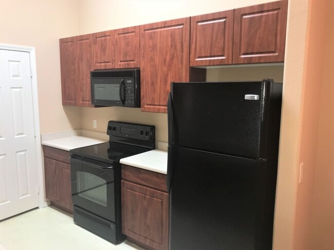 Building Photo - **SPECTACULAR - 2BEDROOM/2BATHROOM/1GARAGE/GATED CONDO (SOUTHERN & CRISMON)**
