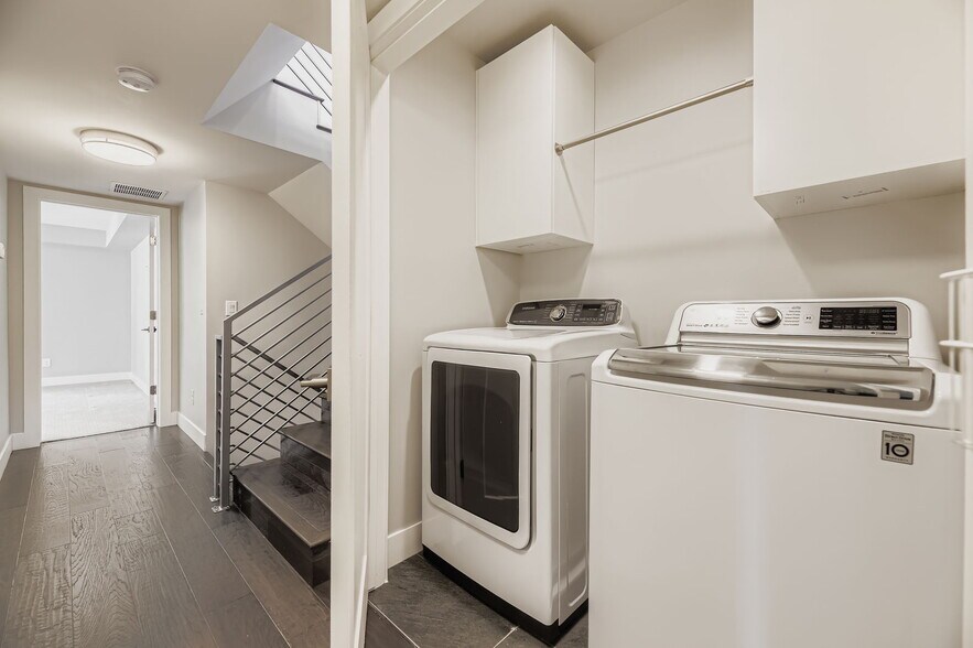 Laundry is on second floor between the two decroom suites - 2765 S Sherman St