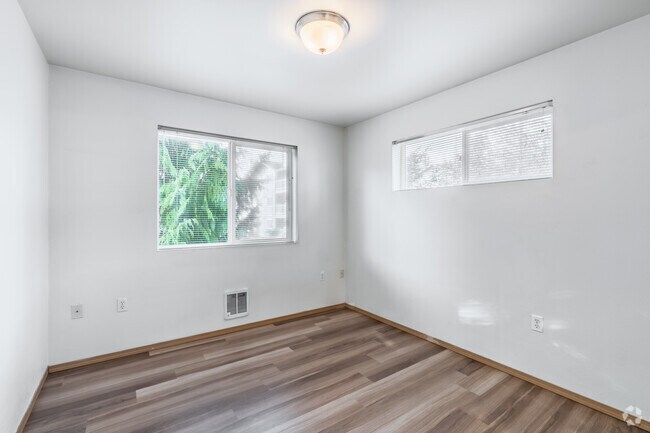3BR, 2BA - 1,100SF - First Bedroom - Broadway Apartments