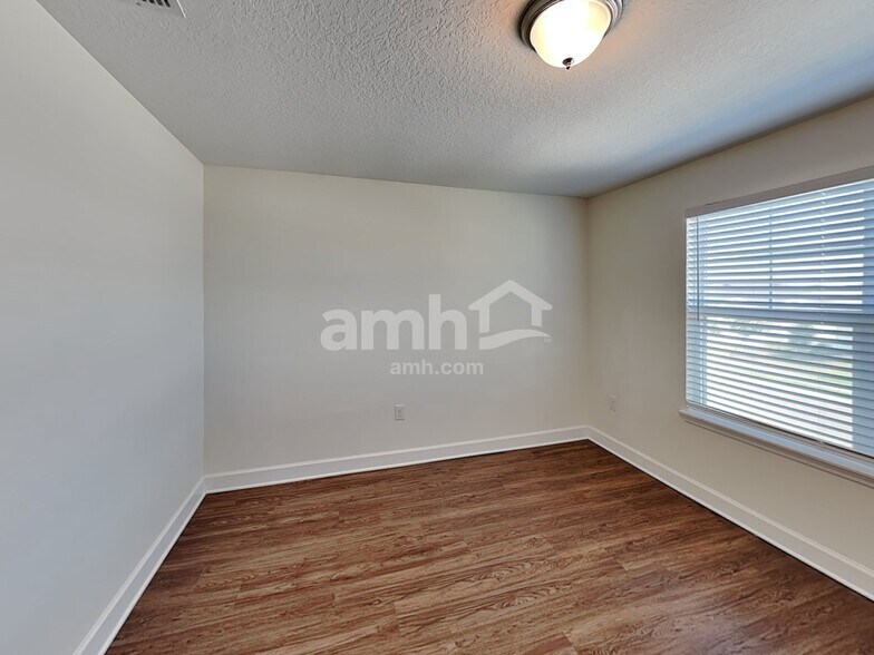 Building Photo - 4501 Reisswood Loop