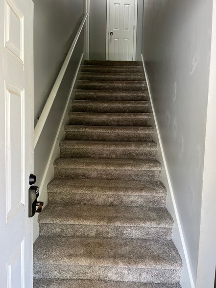 Stairs to 2nd floor - 201 Springfield Cir